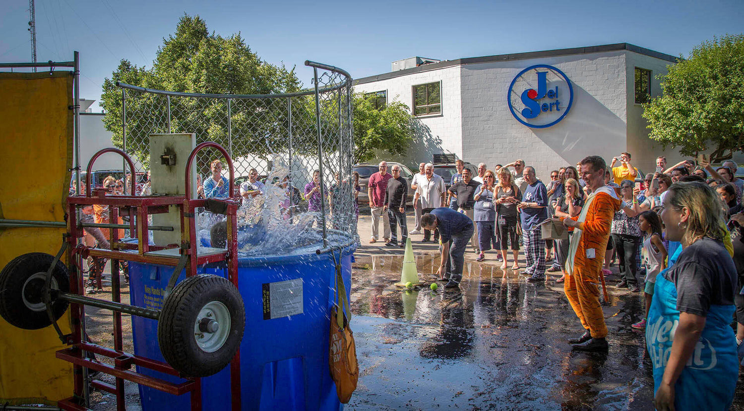 company dunk tank event outside of the office building